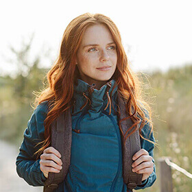 Redheaded woman hiking