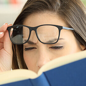 Nearsighted woman with glasses